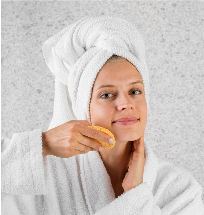 Rub the pad on your face